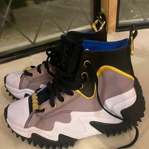 Converse Run Star Motion Platform high tops with black, blue and gold accents